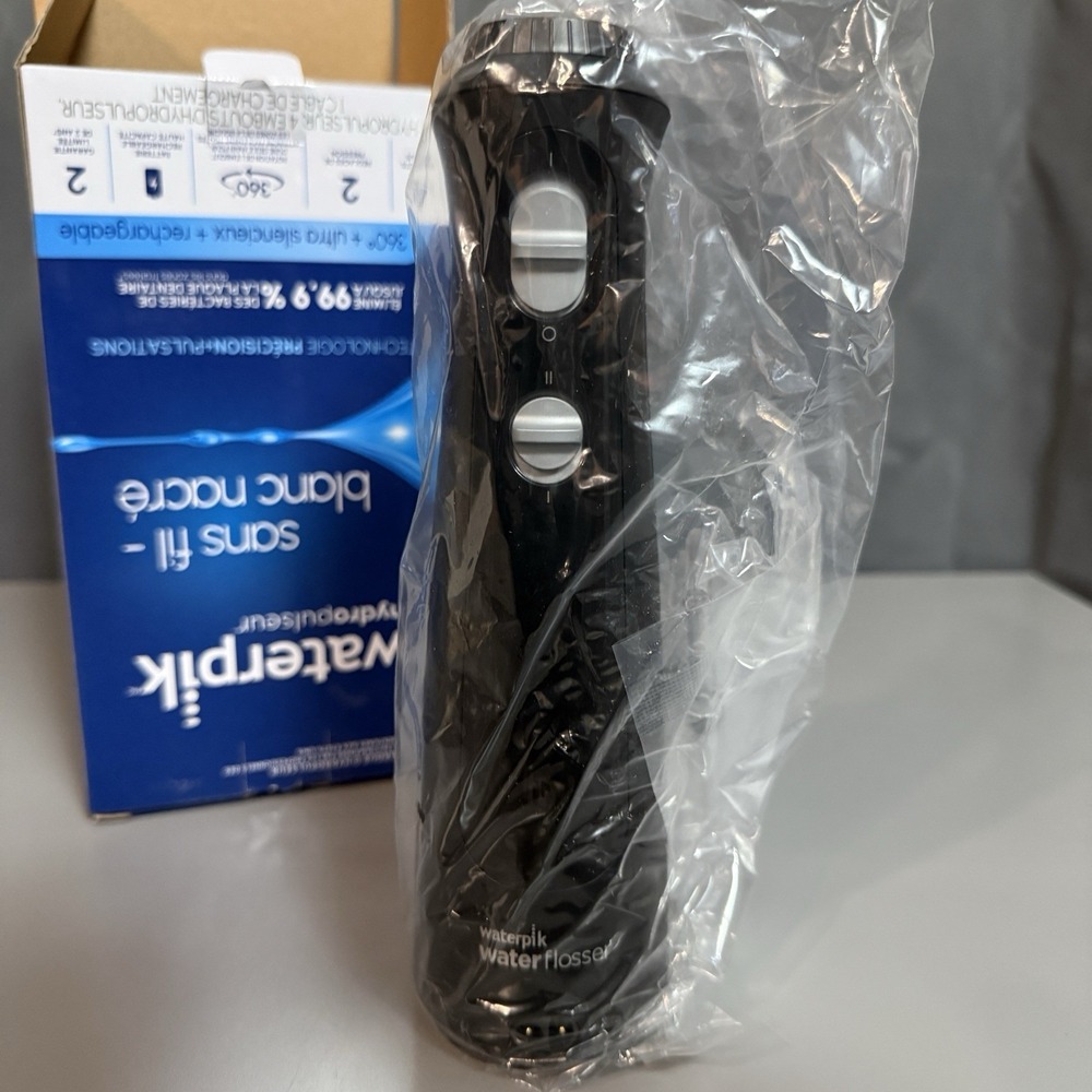 Waterpik Cordless Pearl Black Rechargeable Portable Water Flosser With 4 Tips - Picture 6 of 8